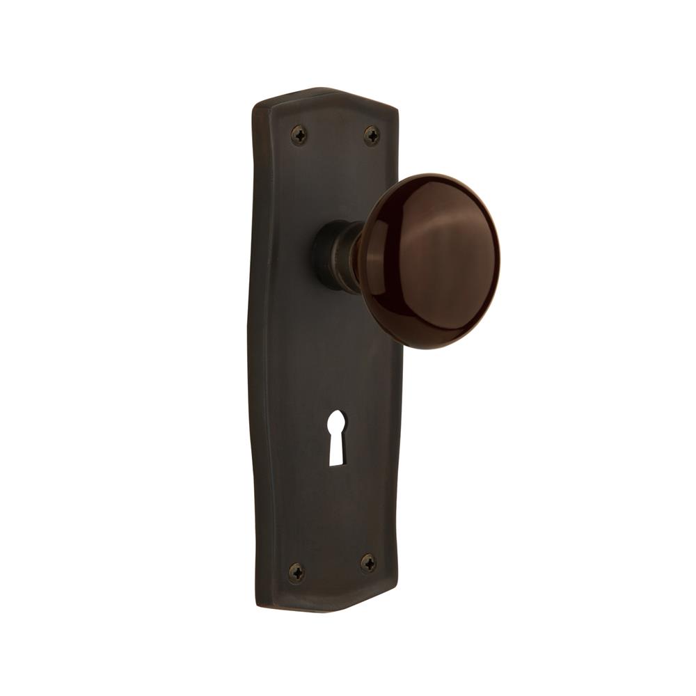 Nostalgic Warehouse PRABRN Privacy Knob Prairie Plate with Brown Porcelain Knob with Keyhole in Oil Rubbed Bronze